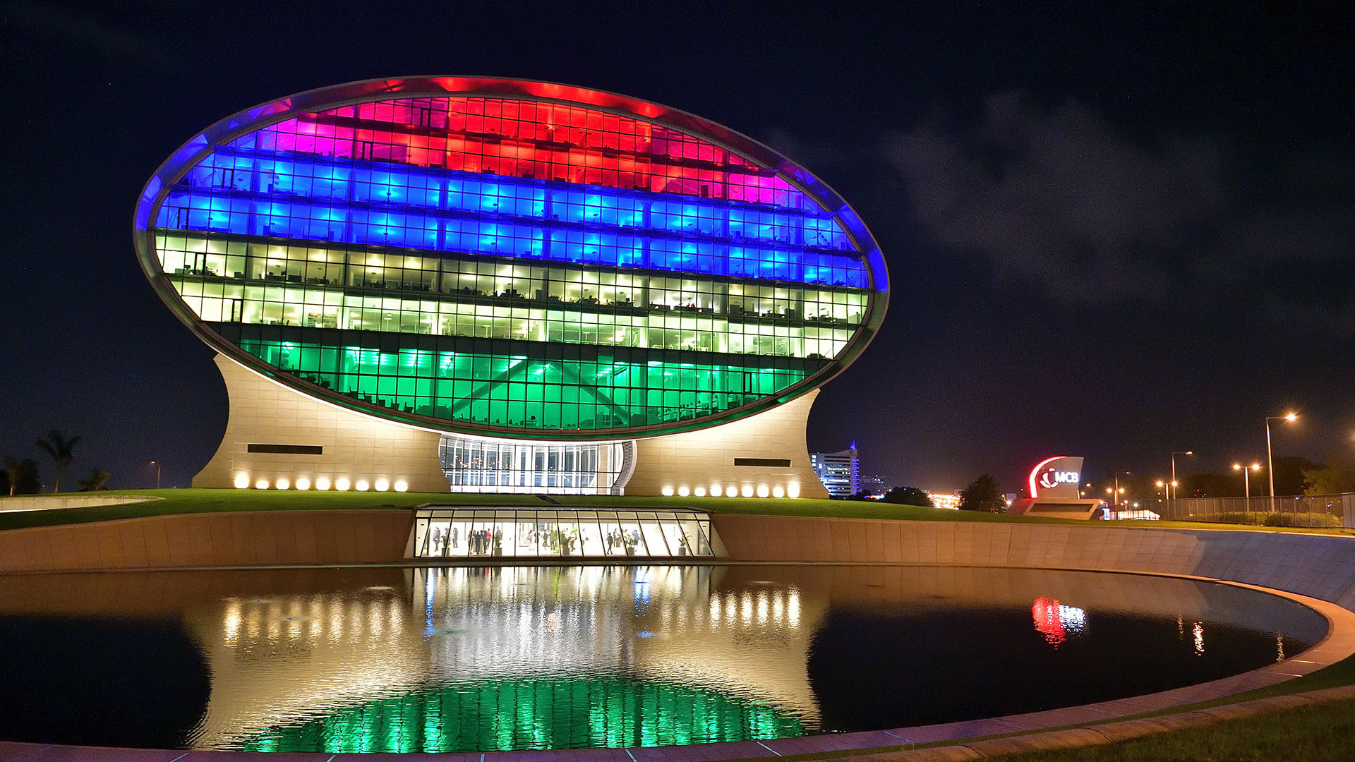 mcb St Jean building photo at night
